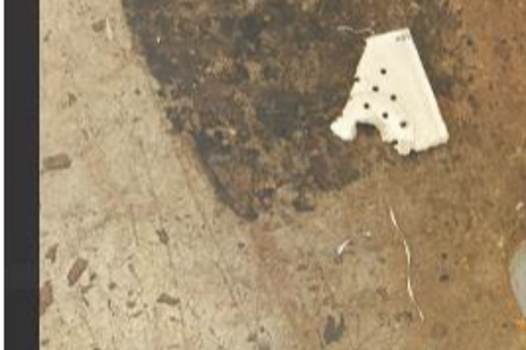 A piece of asbestos-containing ceiling tile that fell during a shop class at Albany Creek State High School.