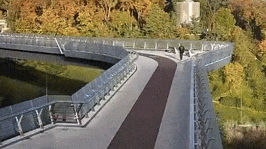 A missile strike near a pedestrian bridge in Ukraine.