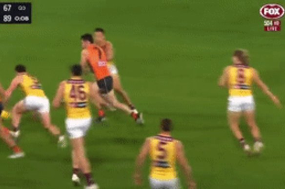 Tackle watch: Callan Ward was penalised for bringing down Brisbane’s Lachie Neale.