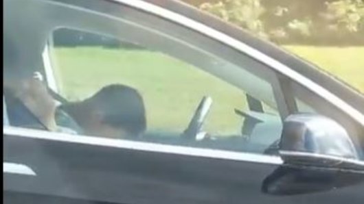 A man filmed what appears to be a sleeping Tesla driver. 