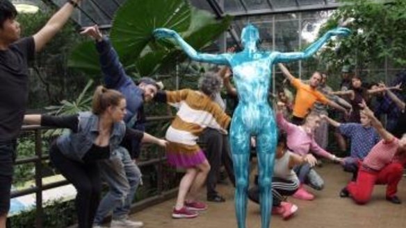 A moment from Frankovich's Defending Plural Experiences, 2014, performed in the butterfly house at Melbourne Zoo.