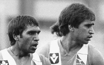 The young Sonja Hood saw star North Melbourne players Jim (left) and Phil Krakouer targeted by racism on the field.