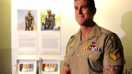 Victoria Cross winner Ben Roberts-Smith in 2011 with his newly installed display in the Hall of Valour at the Australian War Memorial.