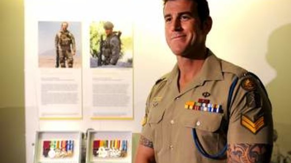 Victoria Cross winner Ben Roberts-Smith in 2011 with his newly installed display in the Hall of Valour at the Australian War Memorial.