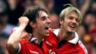 Gary Neville and David Beckham during their playing days at Manchester United.