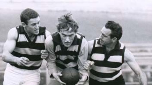 Geelong's coach Peter Pianto (right) putting player Ian Nankervis through a fitness test.
