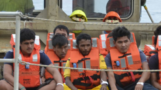 A group of asylum seekers arrive on Christmas Island.