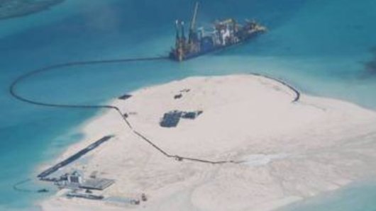 A photo released by the Philippines foreign ministry showing what Manila says are expanded structures on Johnson South Reef in the South China Sea, which is held by China.