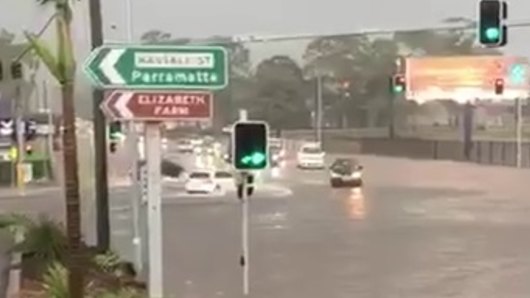 Biblical ... localised flooding in Parramatta along James Ruse Drive on February 8. 