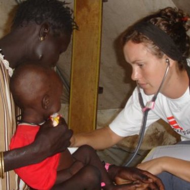 Anna Kent examining a child in 2007 at the Therapeutic Feeding Centre in Leer, in what is now known as South Sudan.