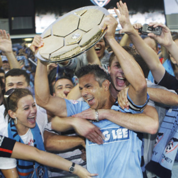 True Sky Blue: Steve Corica celebrates the 2010 premiership as captain of Sydney FC.