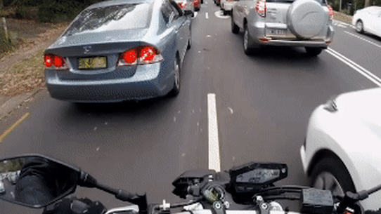 Motorcycle lane filtering GIF 