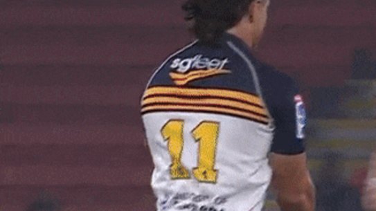 Corey Toole hit during Brumbies-Reds clash