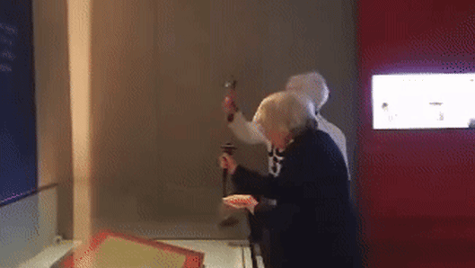The two women attempting to smash the Magna Carta.