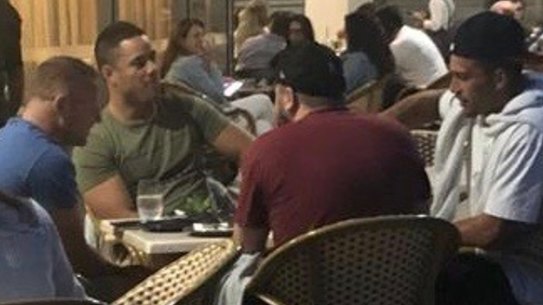 Support: Jarryd Hayne having dinner with former Parramatta teammates Corey Norman and Nathan Brown on Wednesday night.