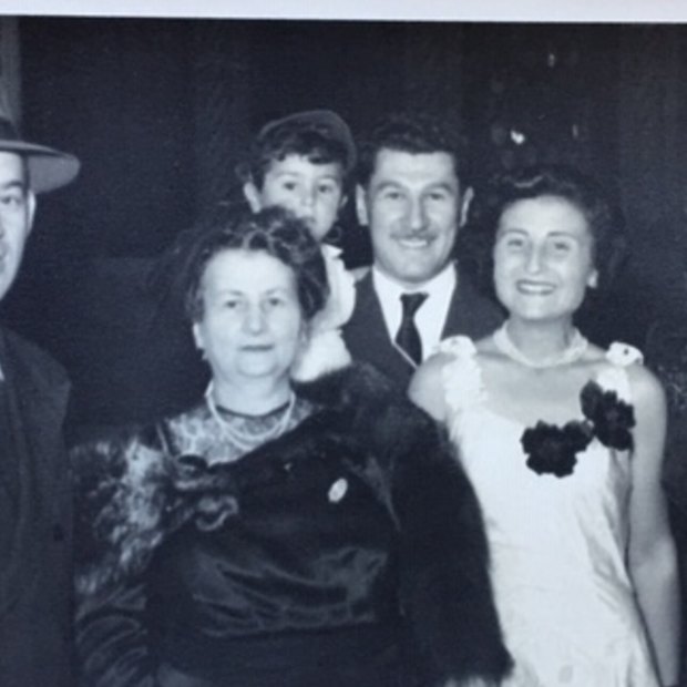 Harry Skorupa, a distant relative of Jaku’s, Flore’s mother Fortunee Molho, Eddie carrying Michael, Flore, and Bella Skorupa. The families lived together on arrival in Sydney and are celebrating a fellow survivor’s wedding  in 1951.