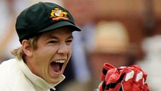 Tim Paine celebrates his first Test catch on debut in 2010.