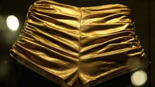 Ready to spin: Kylie Minogue's vintage gold lame hotpants.
