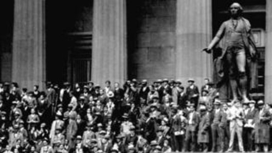 People gather outside the NYSE in 1929. Wall Street's historic 1929 crash led to the Great Depression.