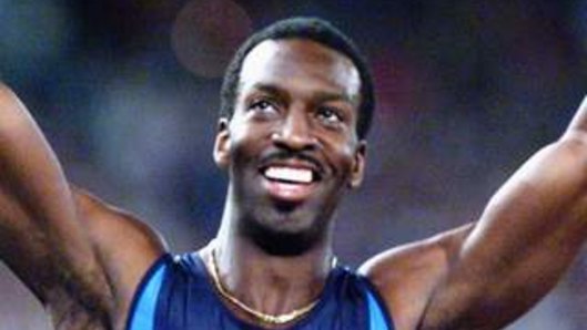 Scary: Michael Johnson, seen here winning the 400m at the Sydney Olympics, says he has suffered a mini-stroke.