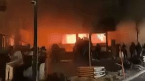 Social media footage shows the bar ablaze.