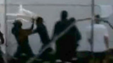 A still from a video recording of the riots inside the Manus Island detention centre in February 2014.