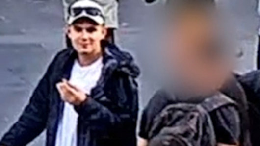 An image of the man police wish to speak to in relation to a sexual assault at Flinders Street Station. 