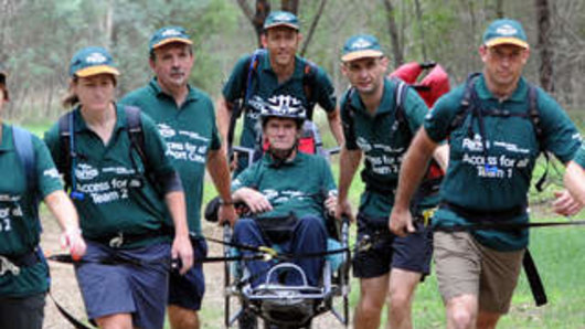 Bruce Towers (centre) train for the Oxfam Trailwalker challenge in 2013.