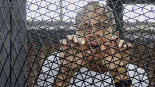 Journalist Peter Greste in the dock of an Egyptian courtroom in 2014.