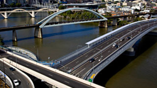 Residents of three suburbs will be granted a toll credit for the Go-Between Bridge (foreground) during the Metro's construction.