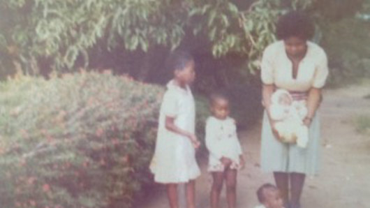 Sisonke, at left, with her sisters,
mother and a baby in Lusaka,
Zambia, circa 1979.