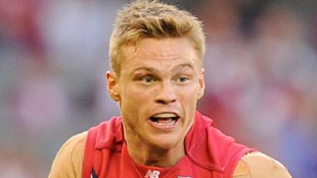 The former midfielder went on to play 157 games for the Demons between 2004 and 2013 and a further six for Fremantle in 2014.