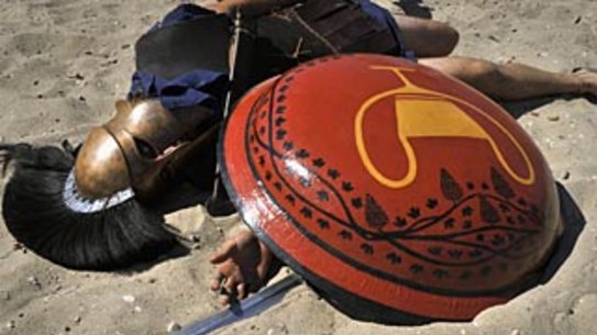 TO GO WITH AFP STORY: History brought to life in Battle of Marathon re-enactment Italian re-enactors dressed as Greek hoplites march to perform the  490 B.C battle of Marathon at the Marathon Bay on September 10, 2011. Sweating beneath heavy armour, a group of die-hard archaeology fans brought the Battle of Marathon to life this weekend near the field where the fate of Europe dramatically changed 2,500 years ago. Gathering from Europe, North America and Australia, the re-enacters staged a three-day event of combat, archaic culture revival and commemoration at Marathon Bay never before seen in Greece despite its rich archaeological heritage. AFP PHOTO / LOUISA GOULIAMAKI