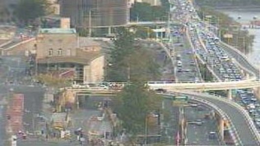 Traffic cameras recorded the minutes after the fatal crash in Brisbane's inner city on Thursday afternoon.