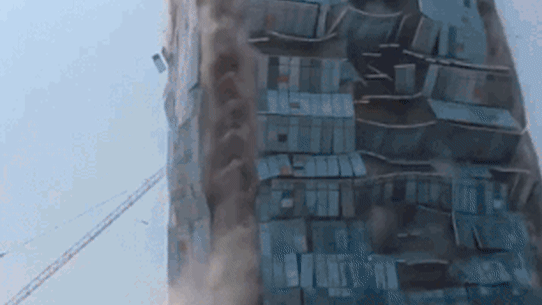 A building under construction in Bangkok collapses after an earthquake on Friday.