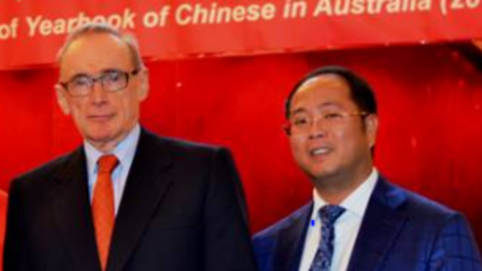 Former foreign minister Bob Carr and Mr Huang. Mr Carr likened his China Relations Institute to the US Studies Centre at Sydney University.
