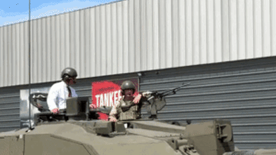 King takes charge of battle tank after embarrassing mix-up over Harry’s palace lodgings