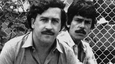 Bolivian drug king-pin Roca Suarez (right) pictured in the 1980s with Colombian drug lord Pablo Escobar.