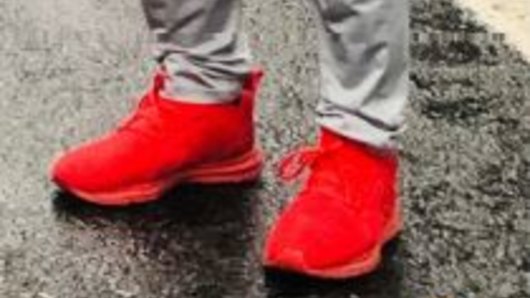 The red shoes he was wearing at the time.