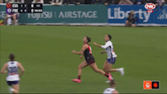 Essendon duo Bonnie Toogood and Amber Clarke collide in the Bombers’ AFLW season-opening match against Fremantle.