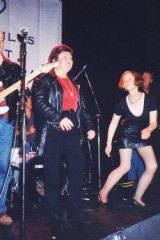 Joan Kirner rocks out with a familiar face in the background: future PM Julia Gillard.