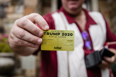  Alec shows off his "Official Trump 2020 Gold Card" which he says he got for contributing to the campaign.