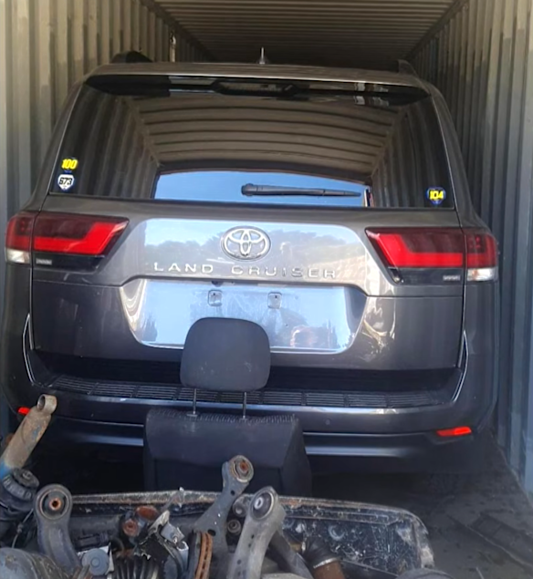 An allegedly-stolen Toyota Landcruiser from Brisbane hidden in a shipping container.