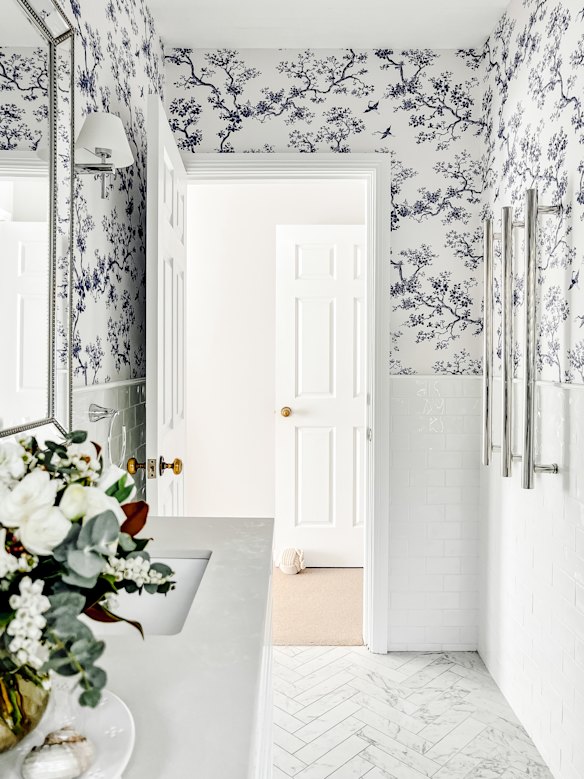 Go bold with wallpaper in the bathroom, such as this custom-designed vinyl-backed paper, suited to wet areas.