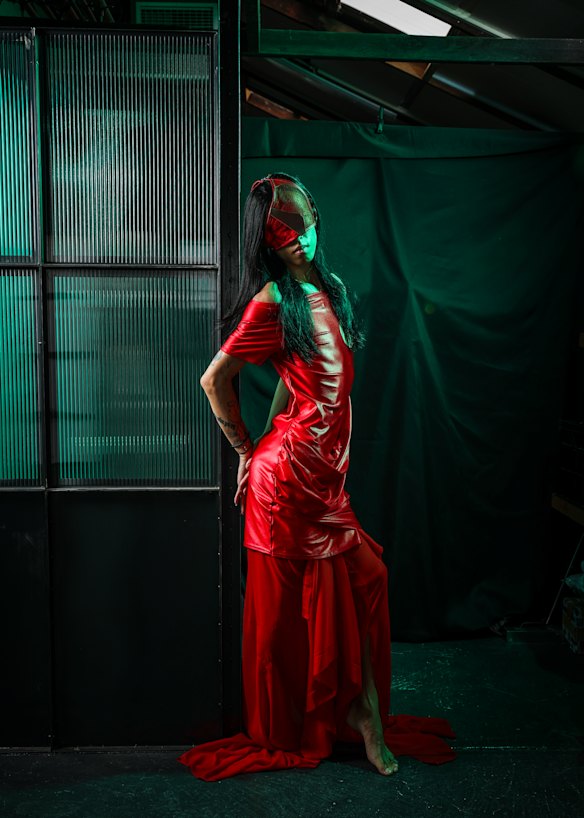 Melbourne designer Jackie Wu (Wackie Ju) wearing a piece from her “Saviour” collection, presented at Australian Fashion Week in 2024.