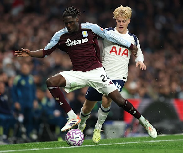 Amadou Onana of Aston Villa is challenged by the Spurs’ Lucas Bergvall.