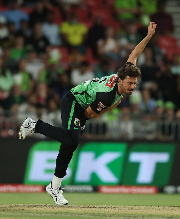 Marcus Stoinis bends his back. 