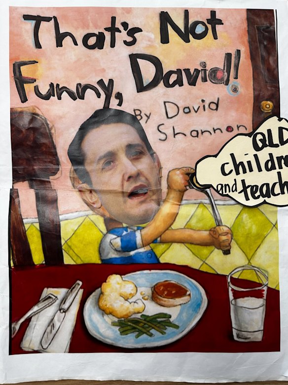 A placard tabled in Queensland parliament after state school teachers went on strike.