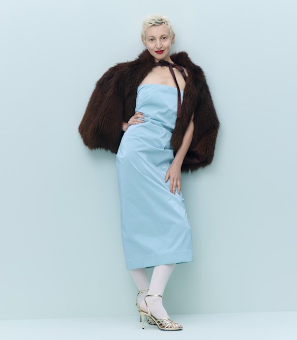 Common Hours dress. Levante tights. Zara sandals. Her own faux fur cape. 