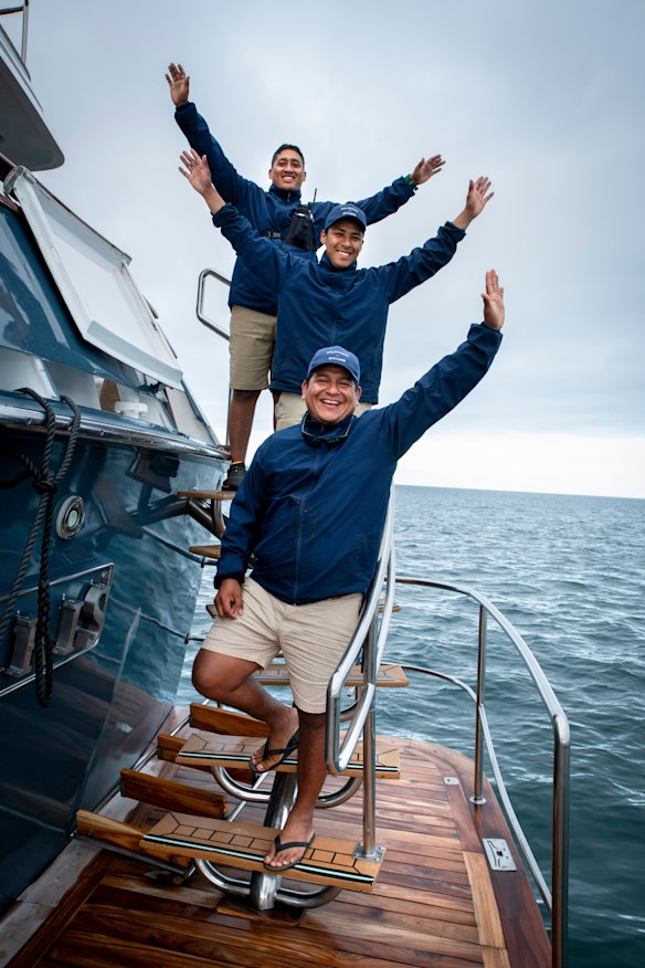 Crew aboard the expedition yacht Galapagos Explorer.